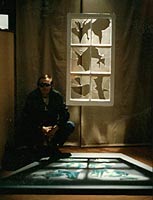 'WINDOW 2' Al posing with piece for photo  - 1984 - Al Razutis - enlarge