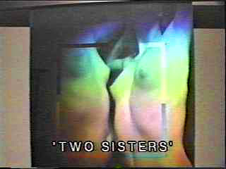 Two Sisters rainbow transmission hologram by Fred Unterseher